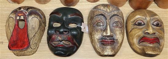 Four Chinese painted carved wood masks